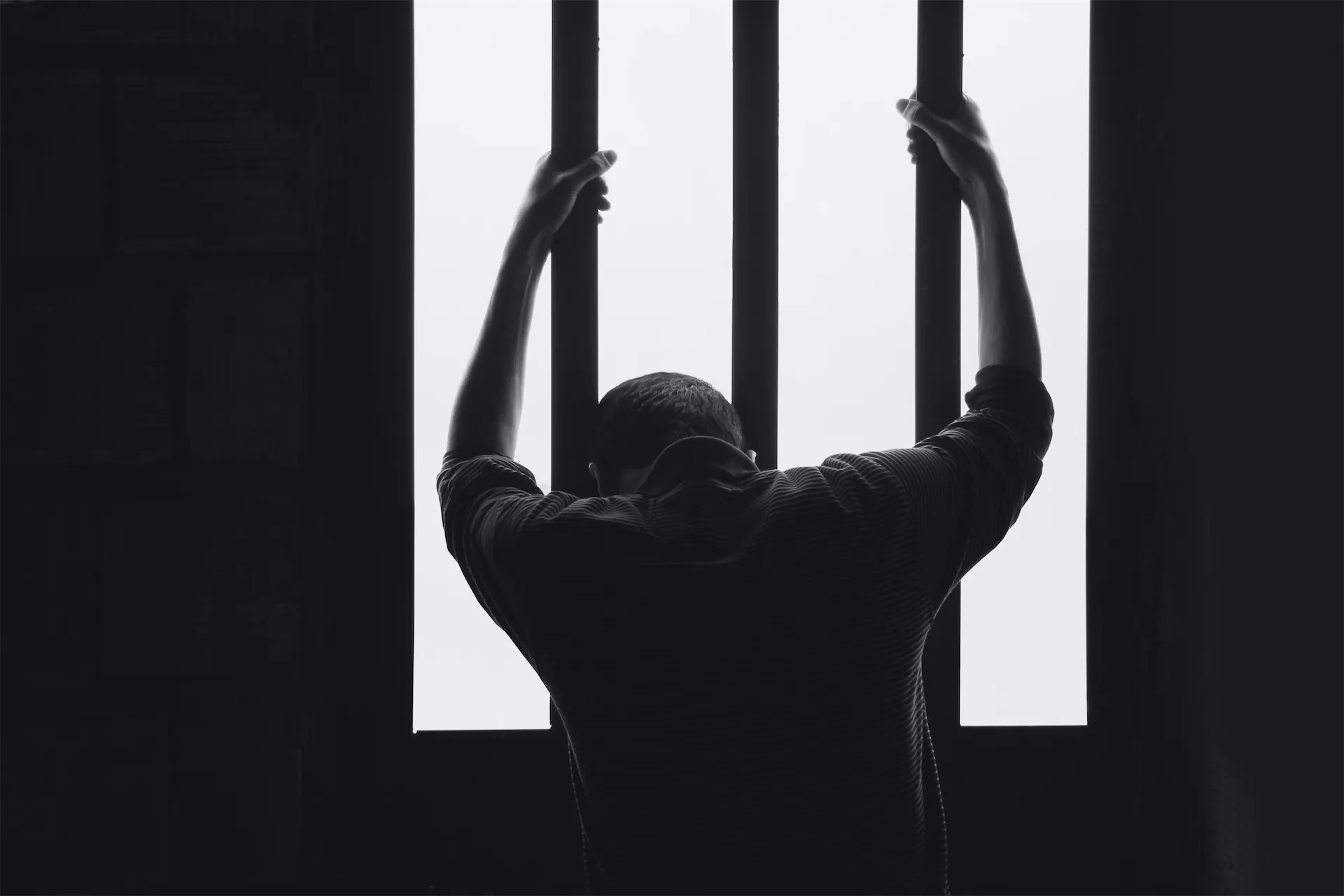 Man behind prison bars